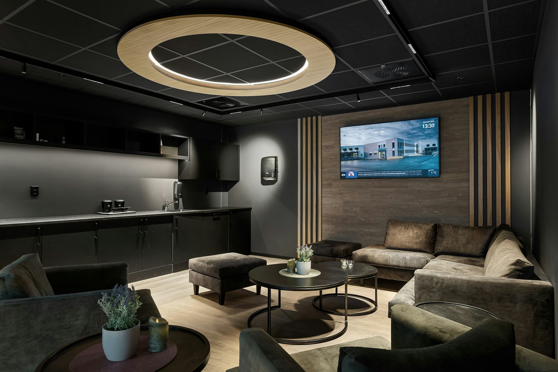 A living room filled with furniture and a flat screen TV
